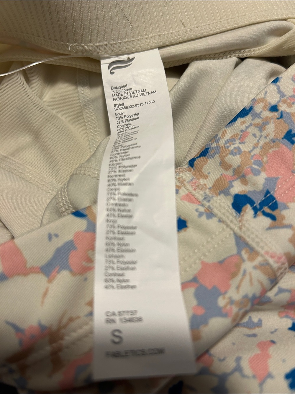 Fabletics High-Rise Pastel Camouflage Bike Shorts in Blue and Pink - Picture 2 of 11